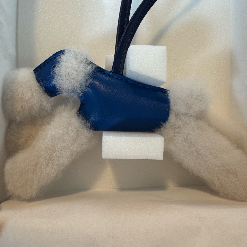 HermeBleu France and Bleu Saphir Milo Lambskin and Ecru Merinos Wool Budy Charm